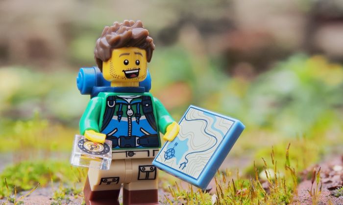 mini Lego hiker with map