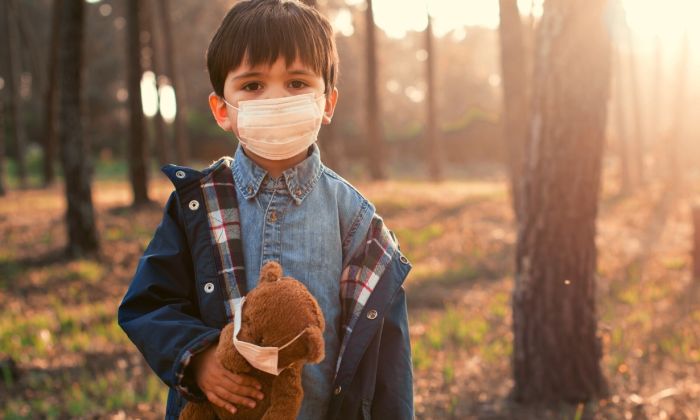 Kindergarten kid wearing a mask