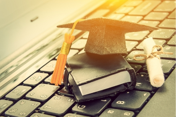 Grad cap on a keyboard