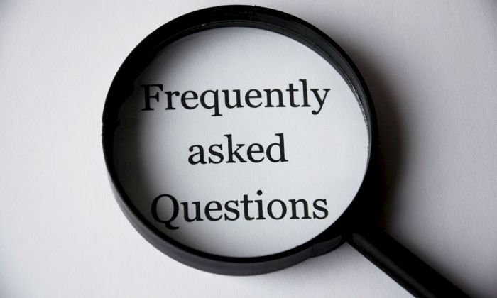 Frequently Asked Questions magnifying glass