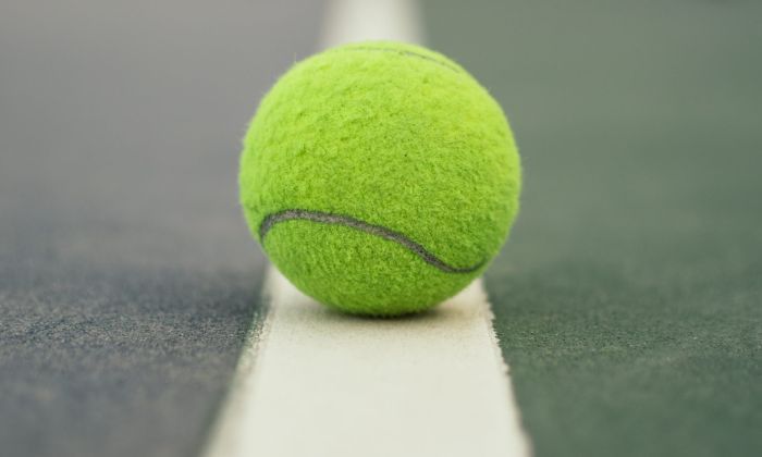 Tennis ball on court