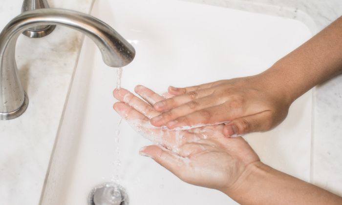 person washing hands